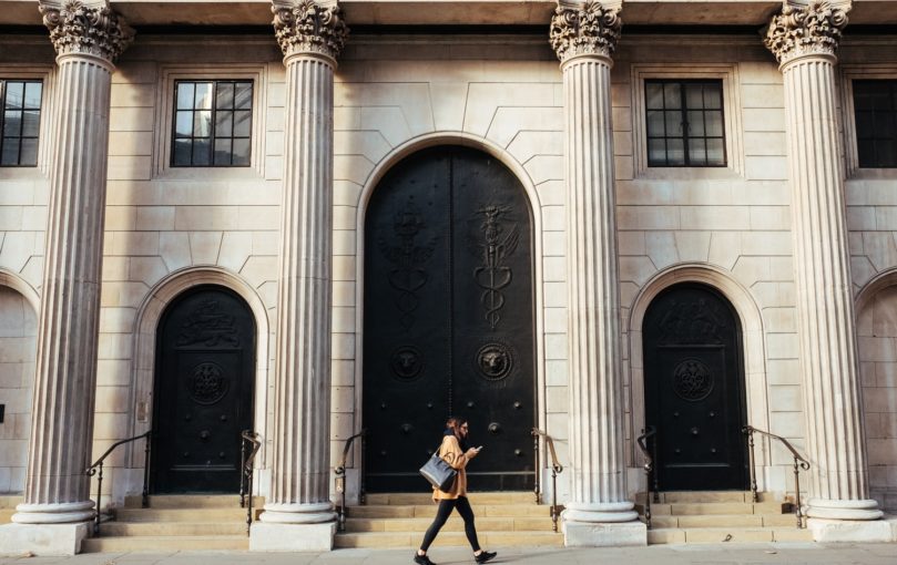 Girl Walking by Bank of England